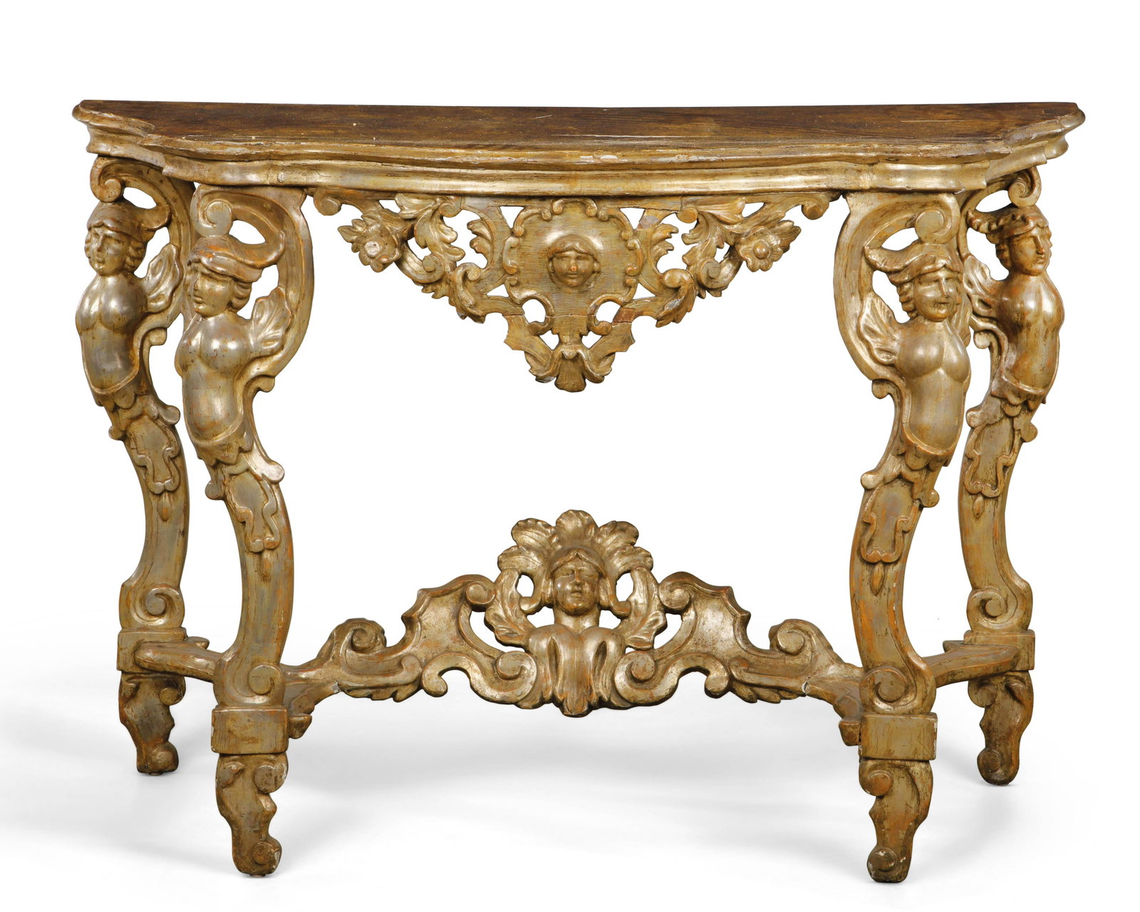An Italian Baroque console table: An Italian Baroque parcel gilt, silvered and faux marble console table first half 18th century height 33 1/4in (84.5cm); width 48 1/2in (123cm); depth 21 1/4in (54cm)