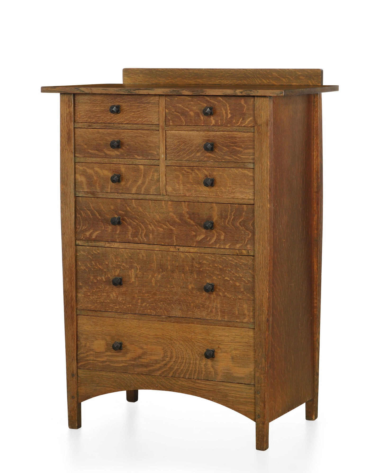 Gustav Stickley Craftsman chest of drawers, 913: A Gustav Stickley Arts & Crafts oak tall chest of drawers, model 913 Craftsman Workshops circa 1905-1912 With red compass decal to interior of drawer. height 50in (127cm); width 36 1/4in (92cm); depth