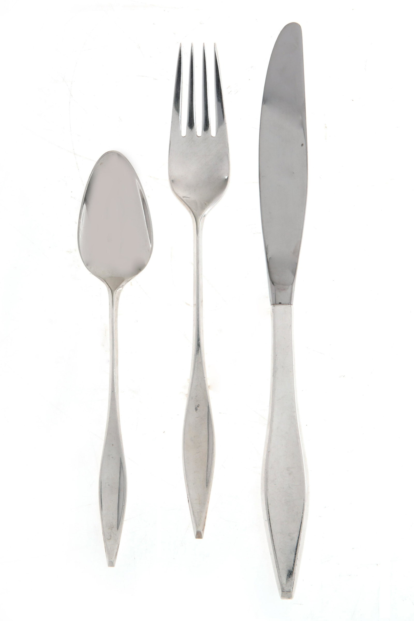 Reed & Barton silver Lark flatware service, Prip: A Reed and Barton sterling silver Lark pattern flatware service for eight designed by John Prip circa 1960 Comprising eight dinner forks, eight dinner knives, eight salad/dessert forks and eight teasp