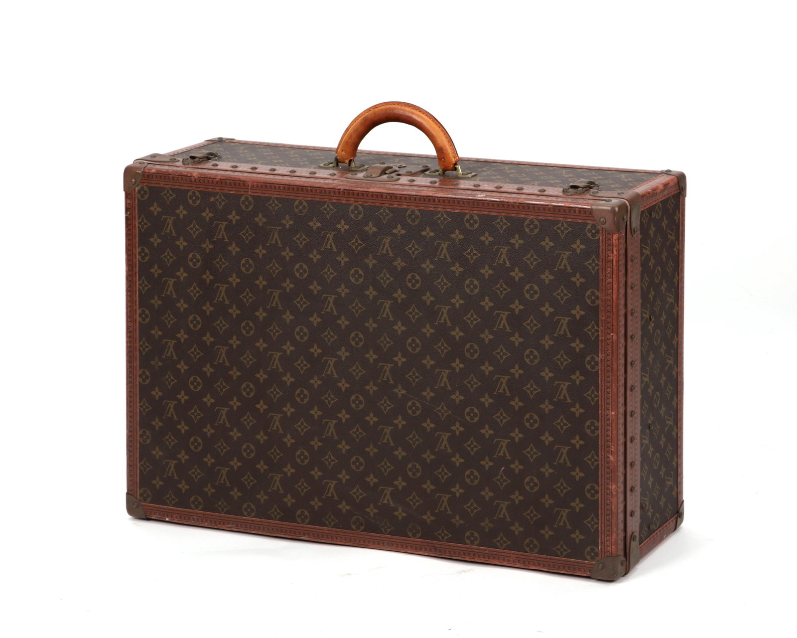 A Louis Vuitton monogram Alzer 70 hard suitcase: A Louis Vuitton monogram Alzer 70 hard sided suitcase circa 1980s Brown and tan coated canvas and a leather rolled top handle and zipper closure. height 18 1/2in (47cm); width 27 1/2in (70cm); depth 8