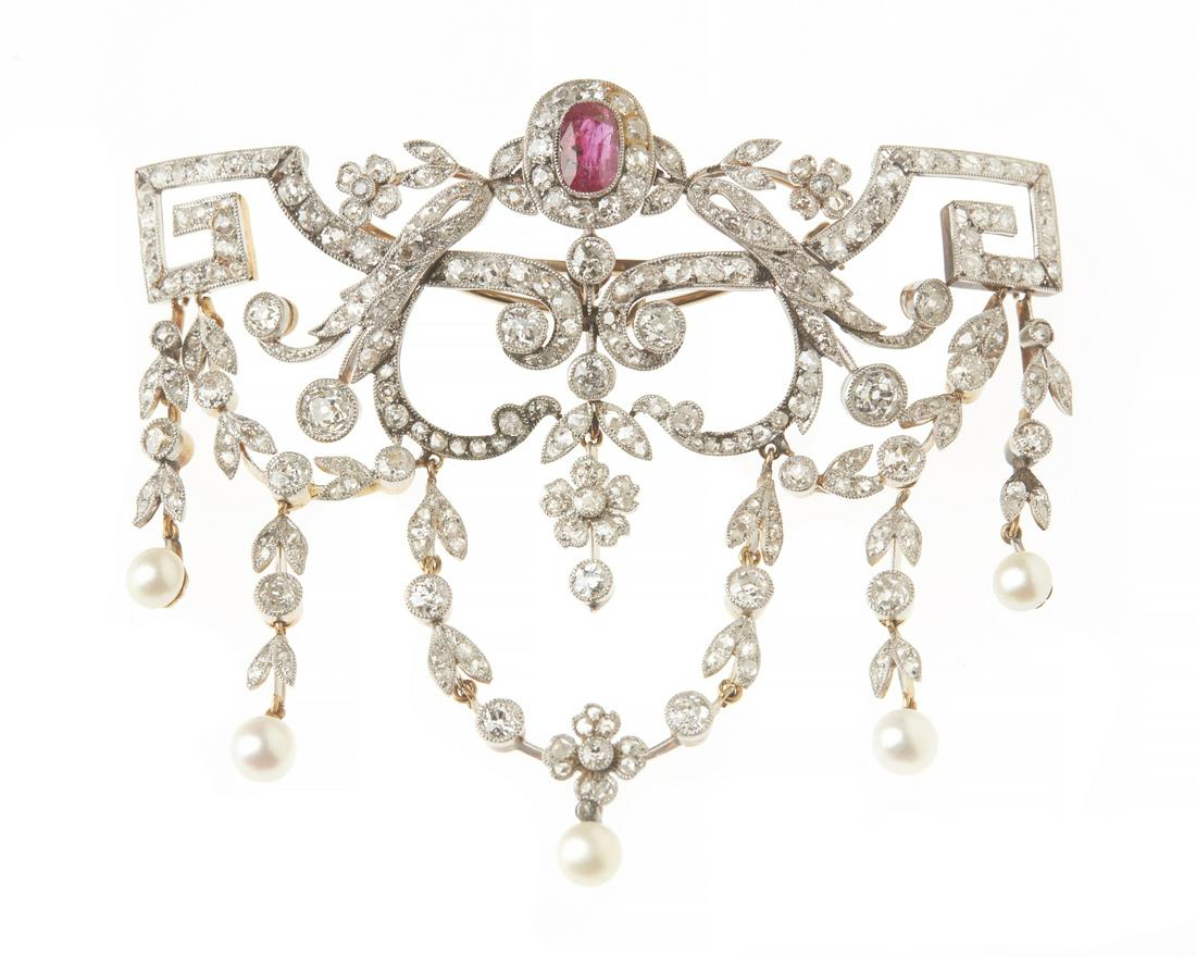 Edwardian diamond, ruby, pearl, gold pin-pendant: An Edwardian diamond, ruby, pearl and platinum-top gold stomacher brooch-pendant circa 1910 Surmounted by an oval ruby, estimated to weigh: 1.90 carats accented by old mine, old single and rose-cut di