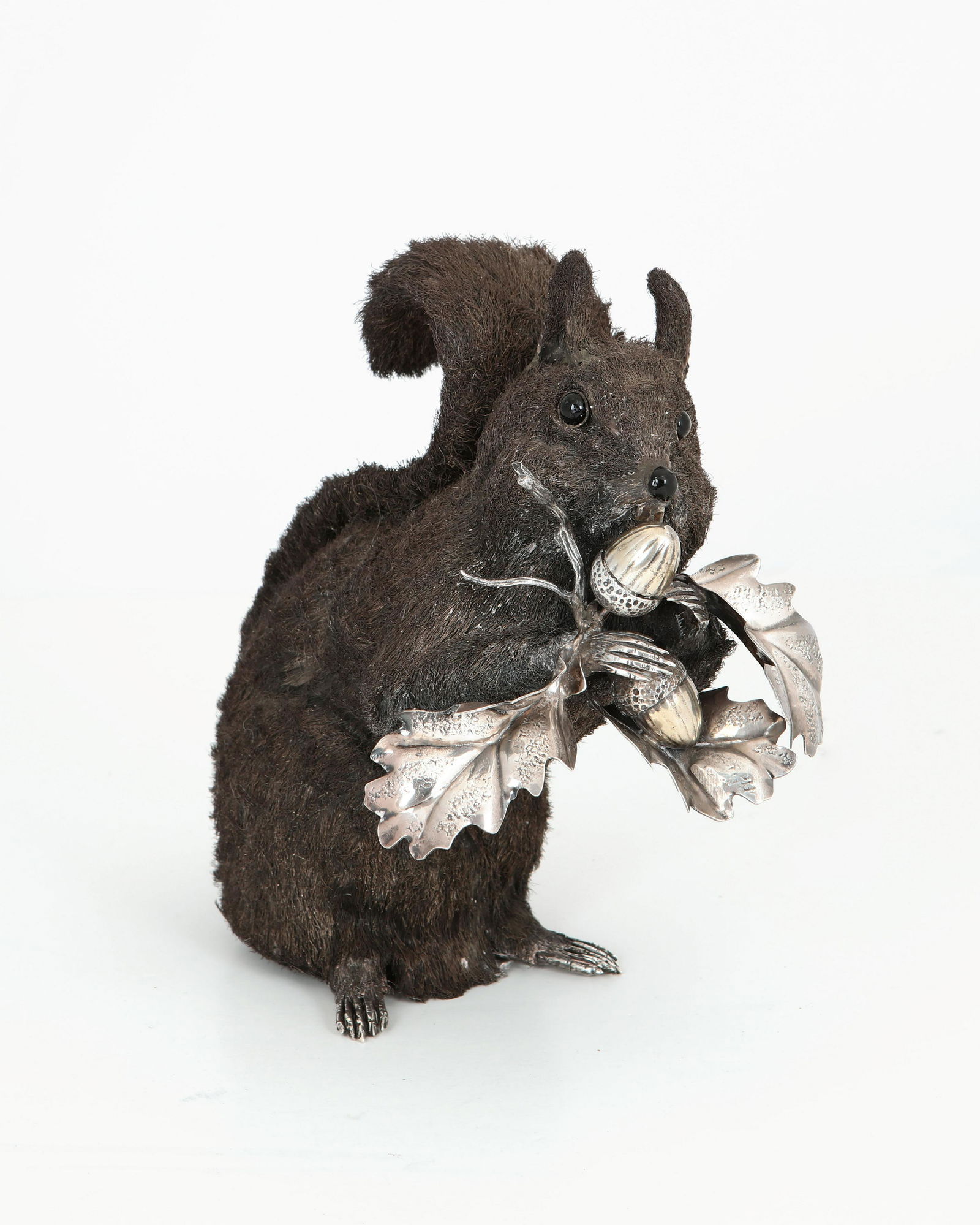 A Mario Buccellati sterling silver model of a squirrel: A Mario Buccellati sterling silver model of a squirrel 20th century height 7 3/4in (19.5cm); weight approximately 22oz