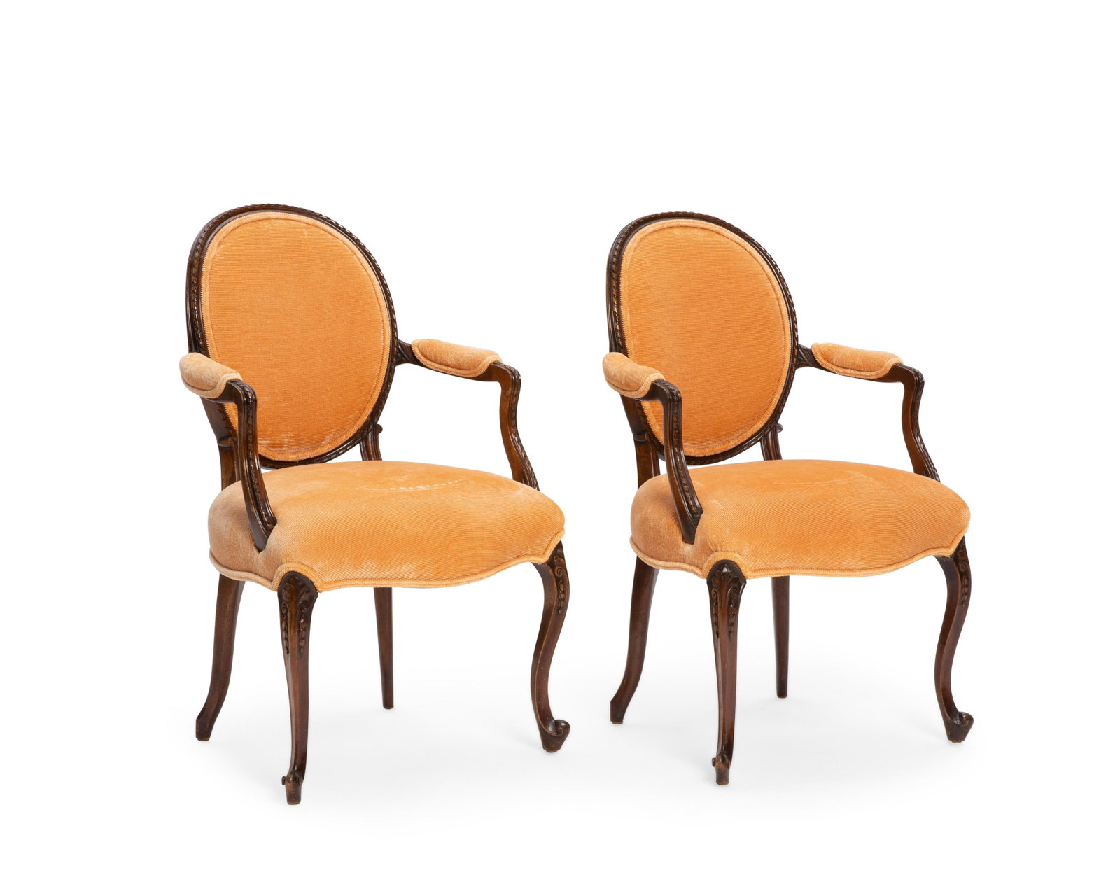 A pair of George III style mahogany armchairs: A pair of George III style mahogany open armchairs 20th century height 36 3/4in (93.5cm); width 23in (58.5cm); depth of seat 19in (48cm) Provenance: Property from the Collection of Yasuko and Maury Kr