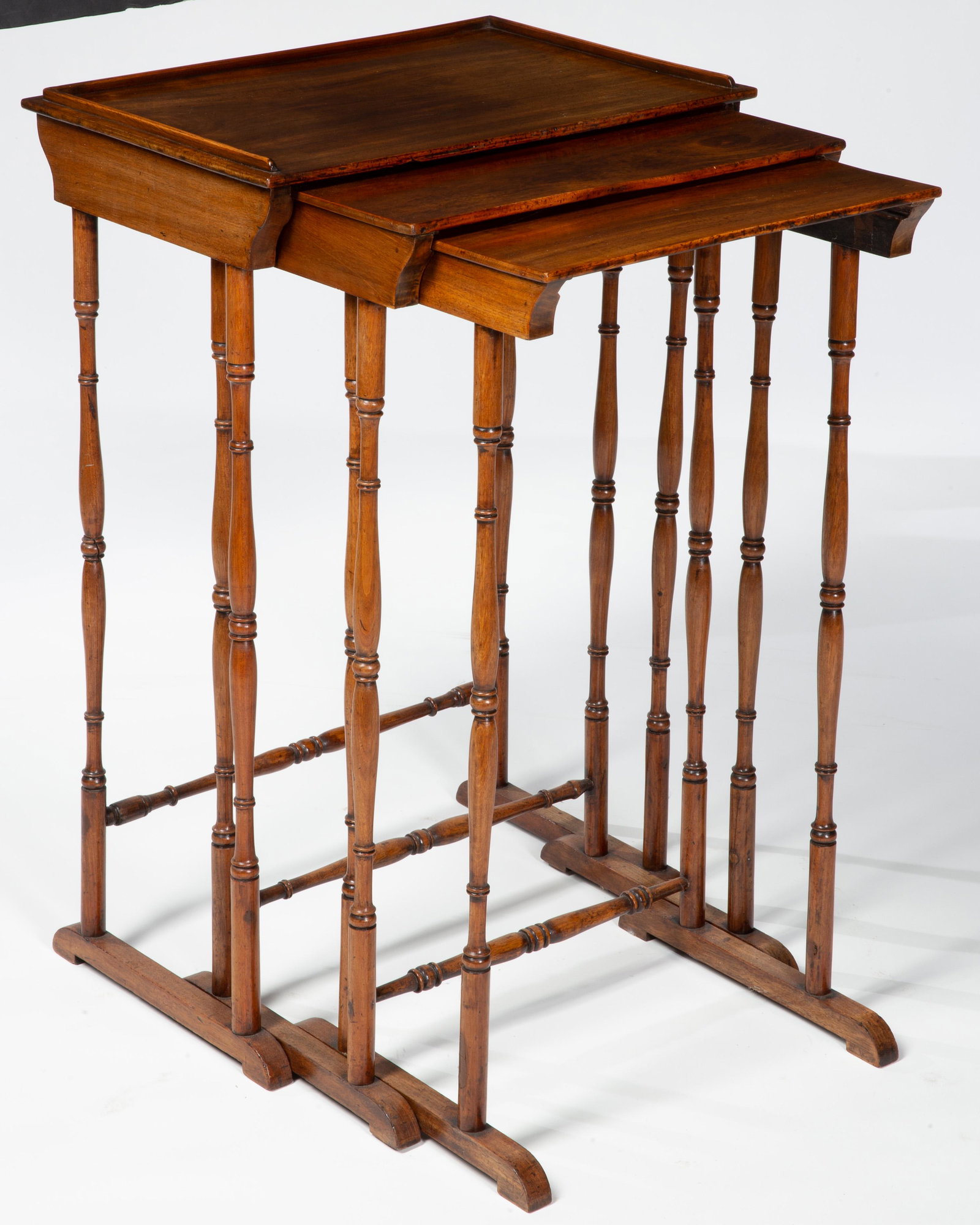 Nest of three Regency mahogany occasional tables: A nest of three Regency mahogany occasional tables early 19th century height of largest 29 1/4in (74.5cm); width 18 3/4in (47.5cm); depth 13in (33cm) Provenance: Property from the Collection of Yasuko