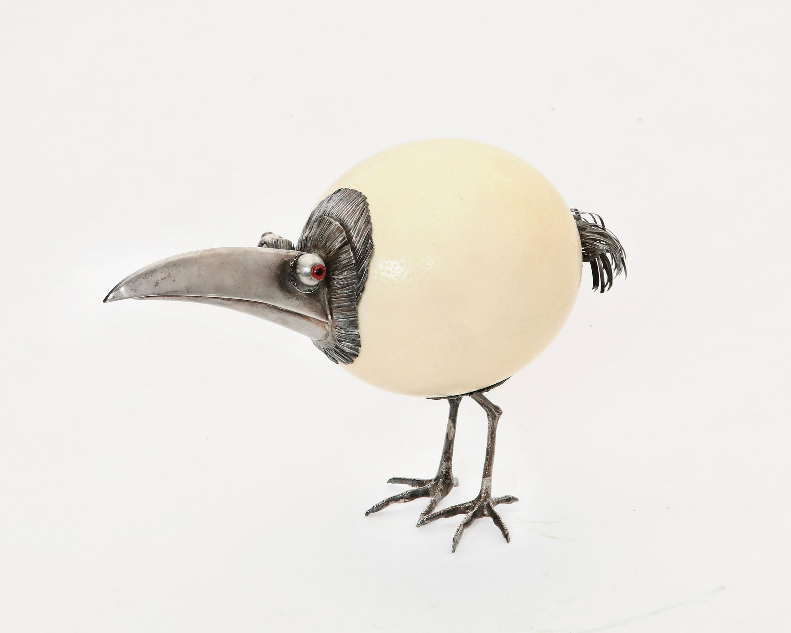 A sterling silver and ostrich egg form bird: A sterling silver and ostrich egg form bird in the manner of Anthony Redmile height 8in (20.5cm); weight approximately 7 troy oz