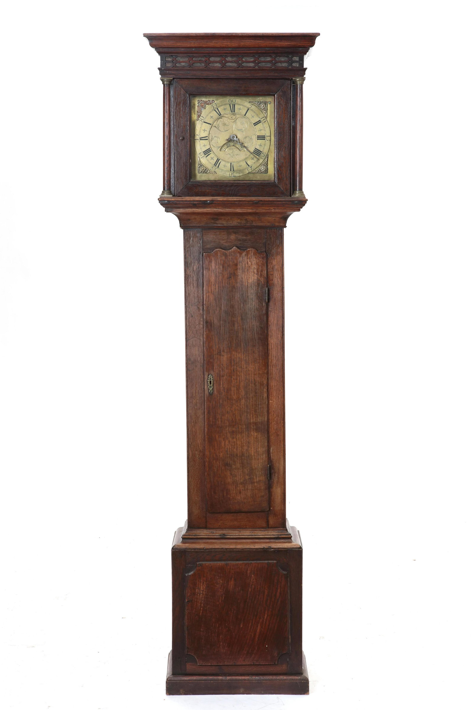 A George III oak thirty-hour tall case clock: A George III oak thirty-hour tall case clock Webster Salop late 18th century Having a ten-inch square brass dial, the chapter ring with Roman hours and Arabic minutes, inscribed Webster Salop, with su