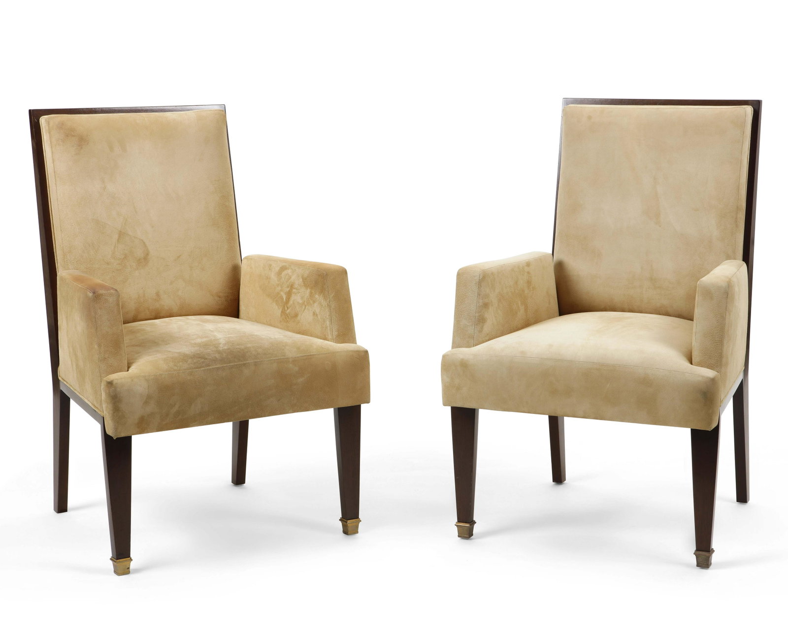 A pair of Art Deco style armchairs, Quinet: A pair of Art Deco style mahogany armchairs in the manner of Jacques Quinet With suede upholstery height 38 3/4in (98.5cm); width 25in (63.5cm); depth of seat 19 1/4in (49cm) Provenance: Property from