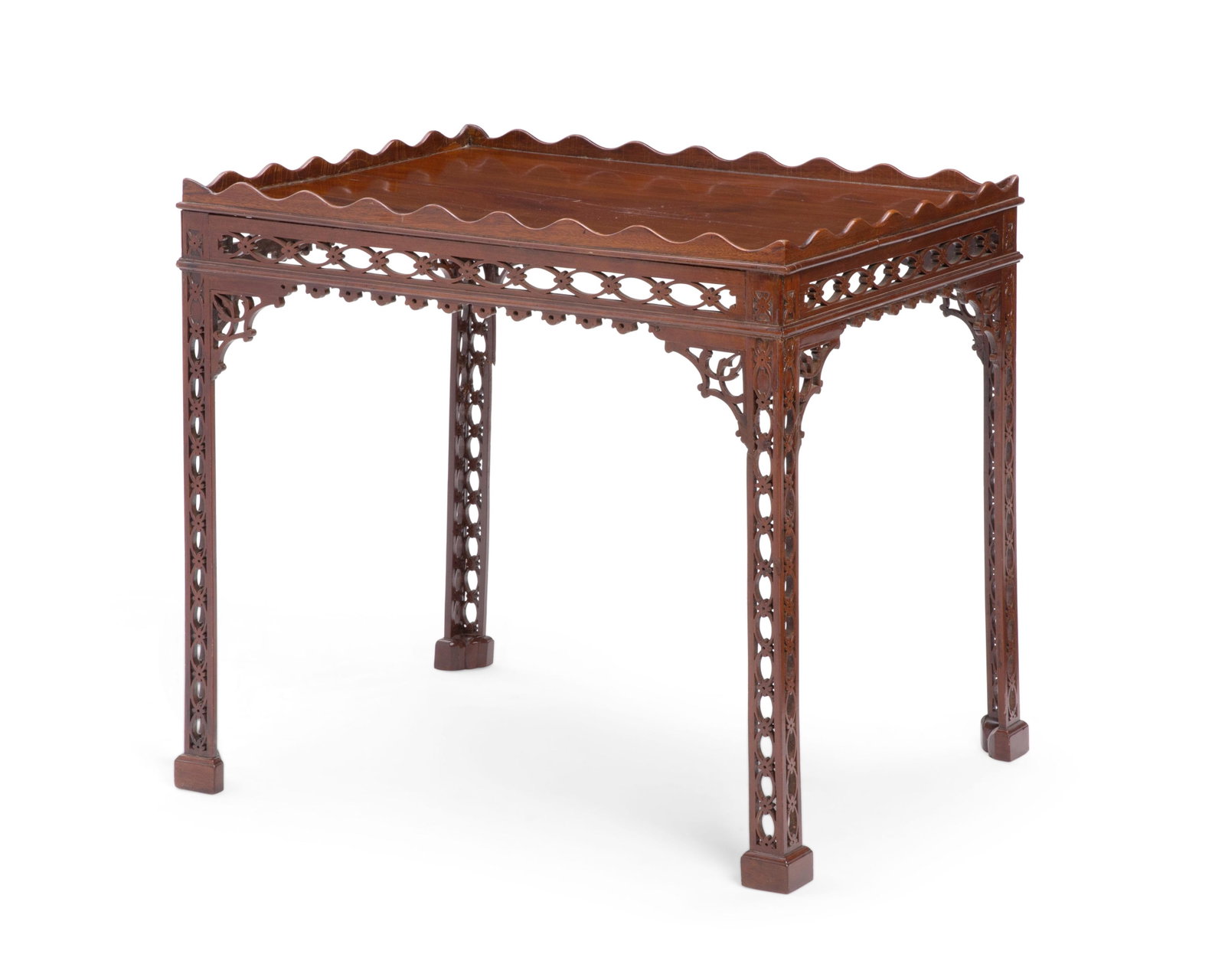 A George III style mahogany silver table: A George III style mahogany silver table incorporating antique elements height 28in (71cm); width 30in (76cm); depth 22 3/4in (58cm) Provenance: Property from the Collection of Therien & Co., Inc.