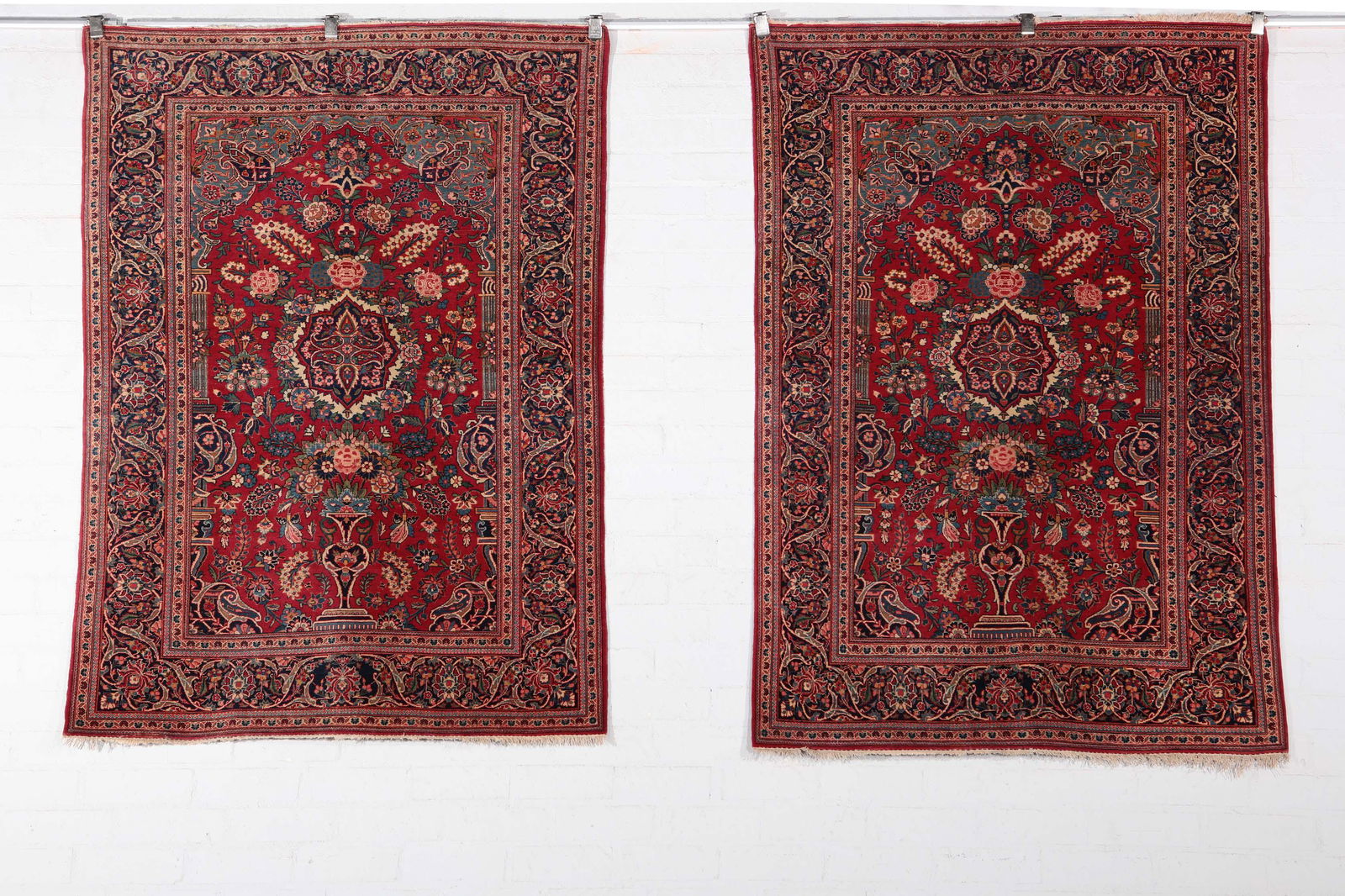 A pair of Kashan rugs, Central Persia: A pair of Kashan rugs Central Persia dimensions approximately 6ft 6in x 4ft 6in (198 x 137cm) Provenance: Property from the Collection of Edward and Mildred Lewis, Bel-Air, California.