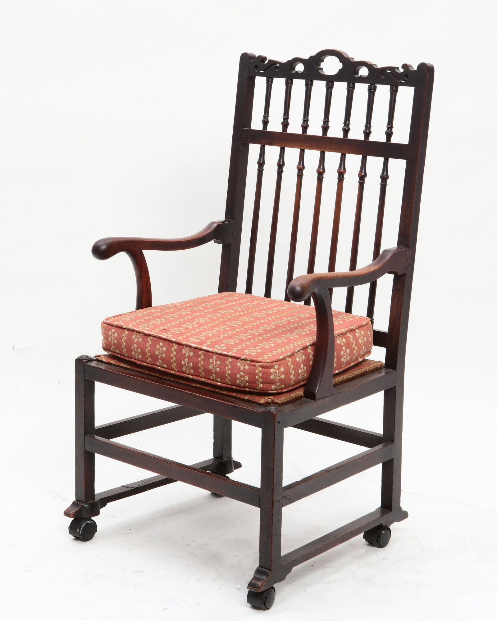A George III mixed wood drunkards armchair: A George III mixed wood drunkards armchair late 18th century height 42 1/2in (108cm); width 25in (63.5cm); depth of seat 19 1/2in (49.5cm) Provenance: Property from the Collection of Edward and Mildre