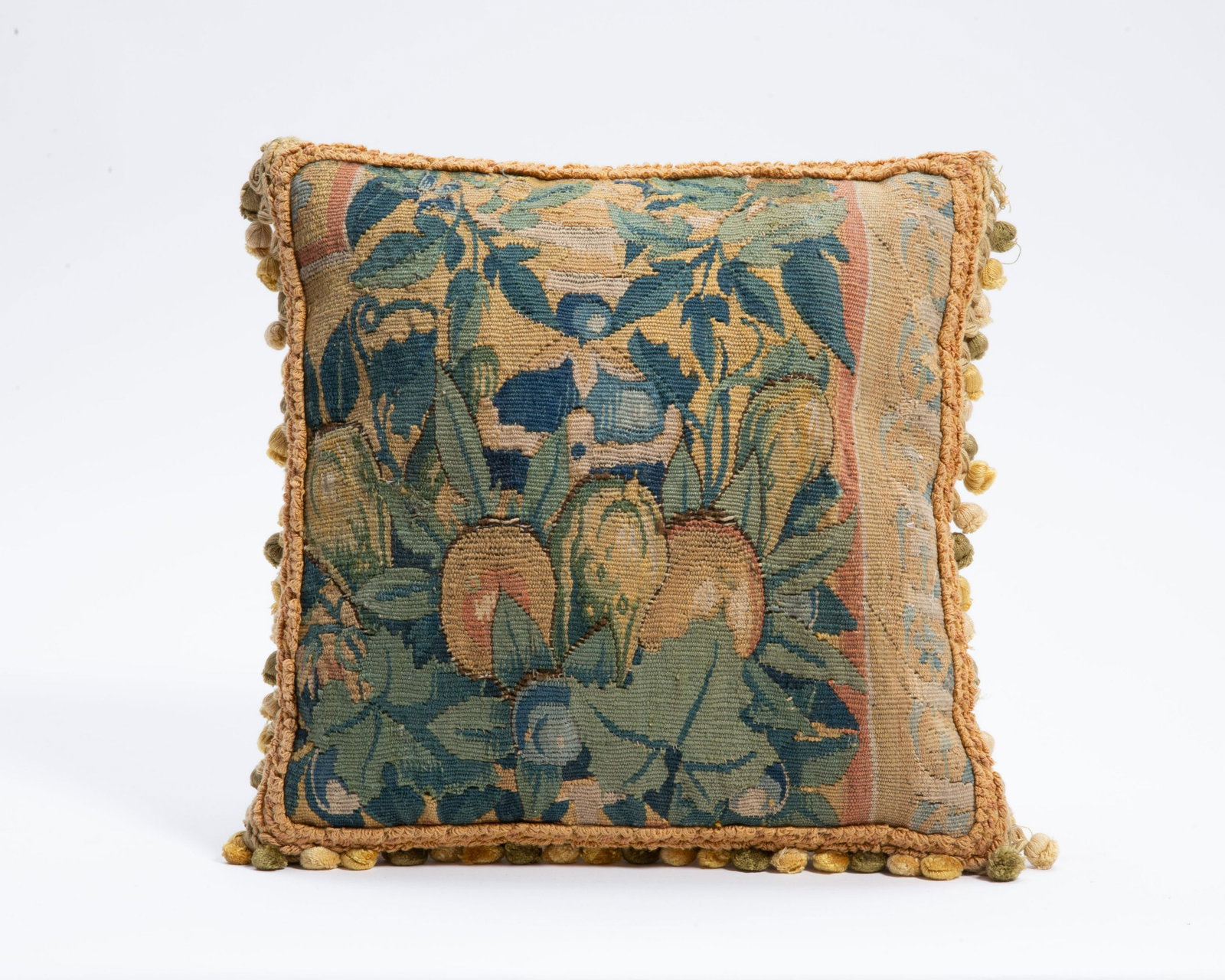 A Flemish Baroque tapestry fragment pillow: A Flemish Baroque tapestry fragment pillow tapestry panel 17th century 15 x 15in (38cm)