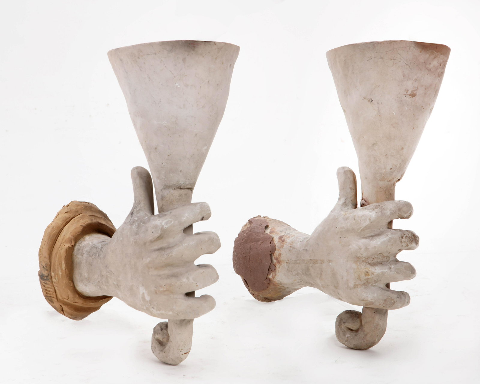 A pair of composition wall hand form lights: A pair of composition wall hand form lights height 14 1/4in (36cm)