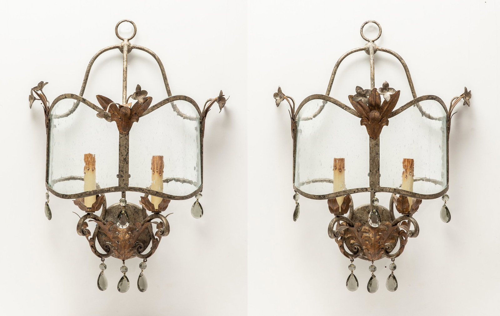 Pair of Baroque style metal and glass wall lights: A pair of Continental Baroque style gilt and silvered metal and glass twin branch wall lights late 20th century height 20in (51cm); width 16in (40.5cm); depth 9in (23cm) Provenance: Property from a Pr