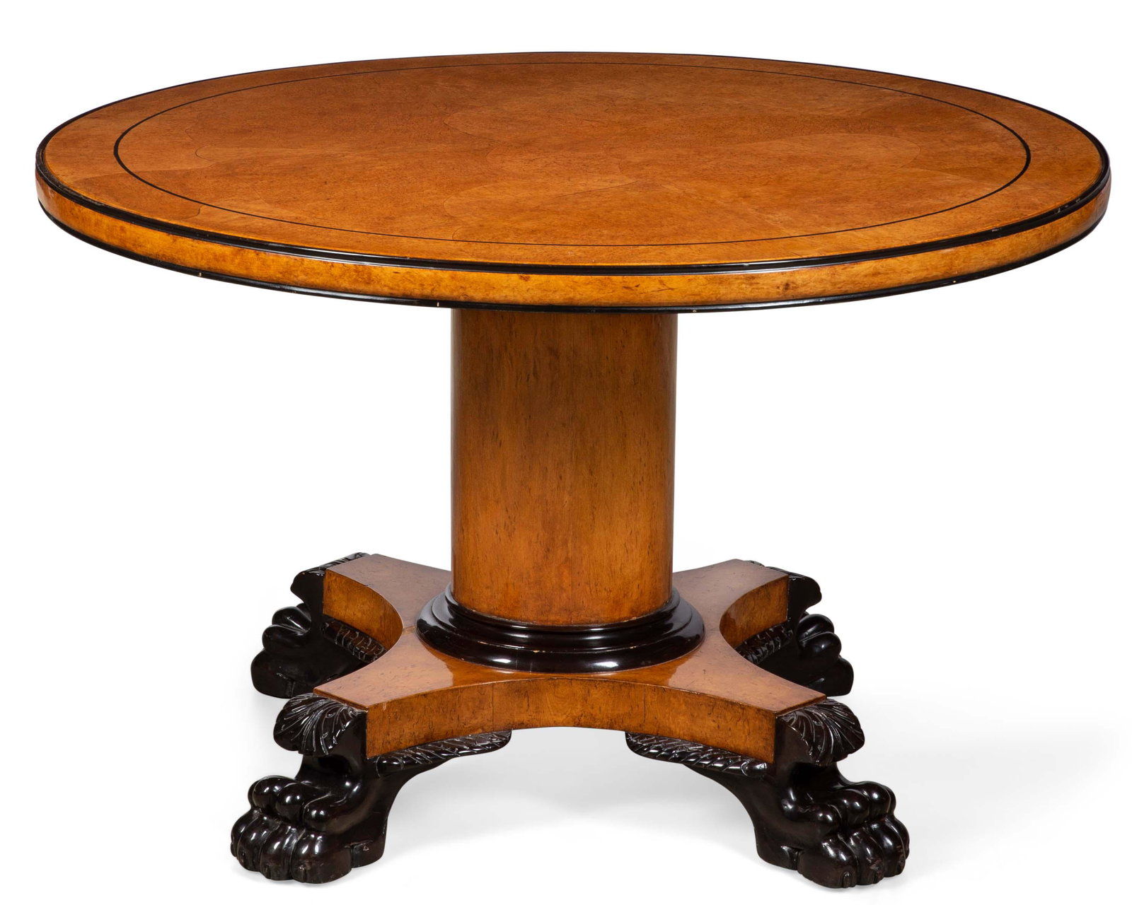 A Therien Studio Biedermeier style center table: A Therien Studio Workshops Biedermeier style parcel ebonized burlwood center table modern height 29 3/4in (76cm); diameter 48in (122cm)
