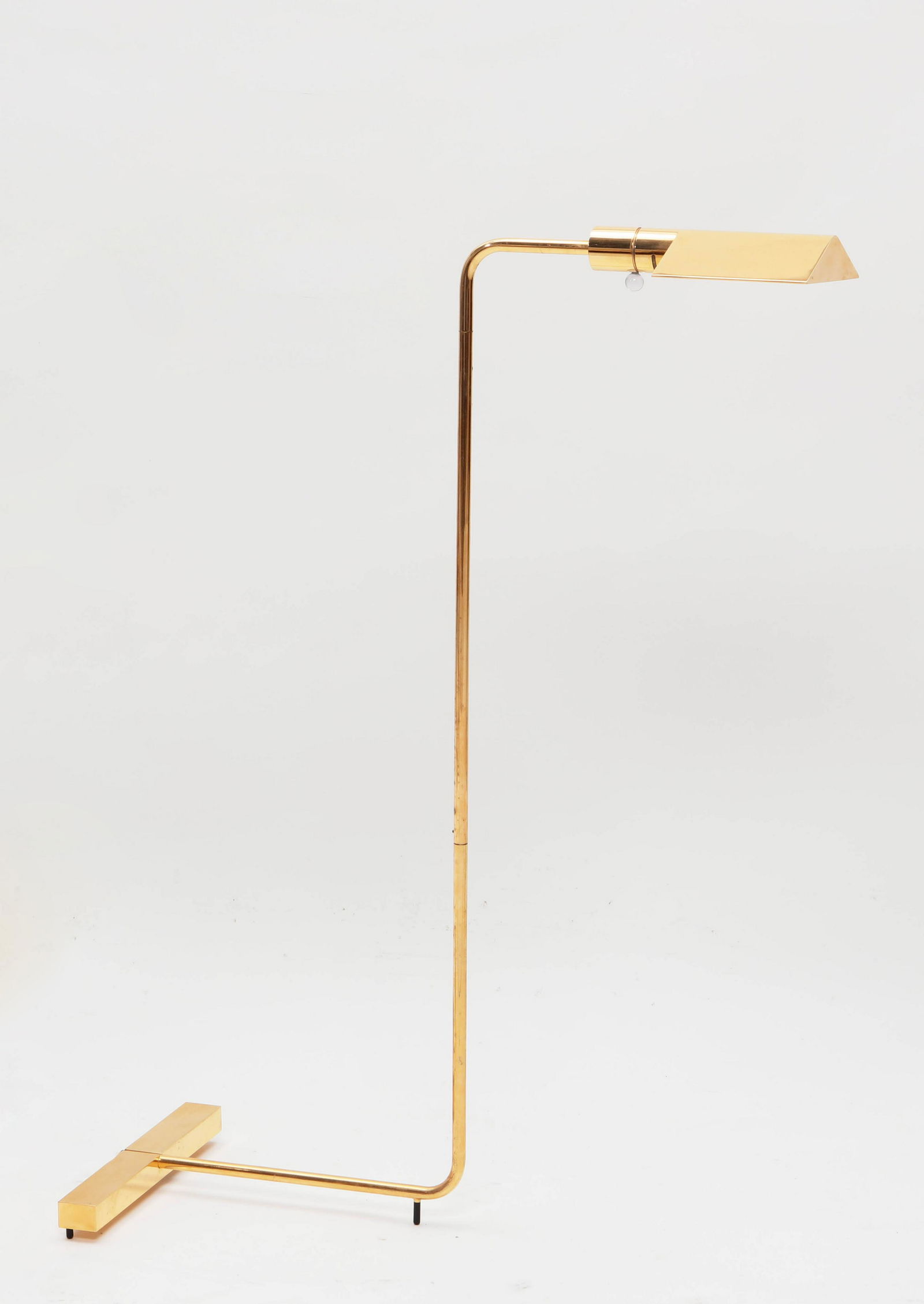 A Cedric Hartman brass and steel floor lamp: A Cedric Hartman brass and stainless steel floor lamp 20th century Impressed manufacturer s mark to underside and 000403. height 36 1/2in (92.5cm) Provenance: Property from the Estate Francis A. Marti