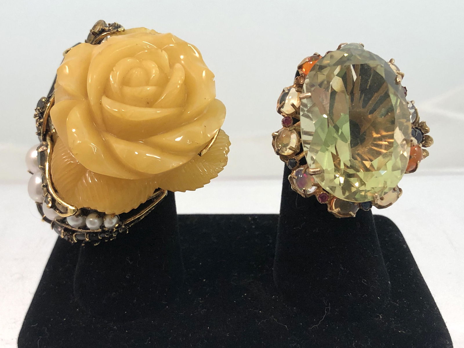 Iradj Moini ring/brooch & 14k gold & stone ring: An Iradj Moini convertible ring/brooch and a 14k gold multicolor stone ring sizes 6 1/2 and 8, respectivelyProvenance: Property from the Estate of June D. Winkler, Beverly Hills and Rancho Mirage, Cal