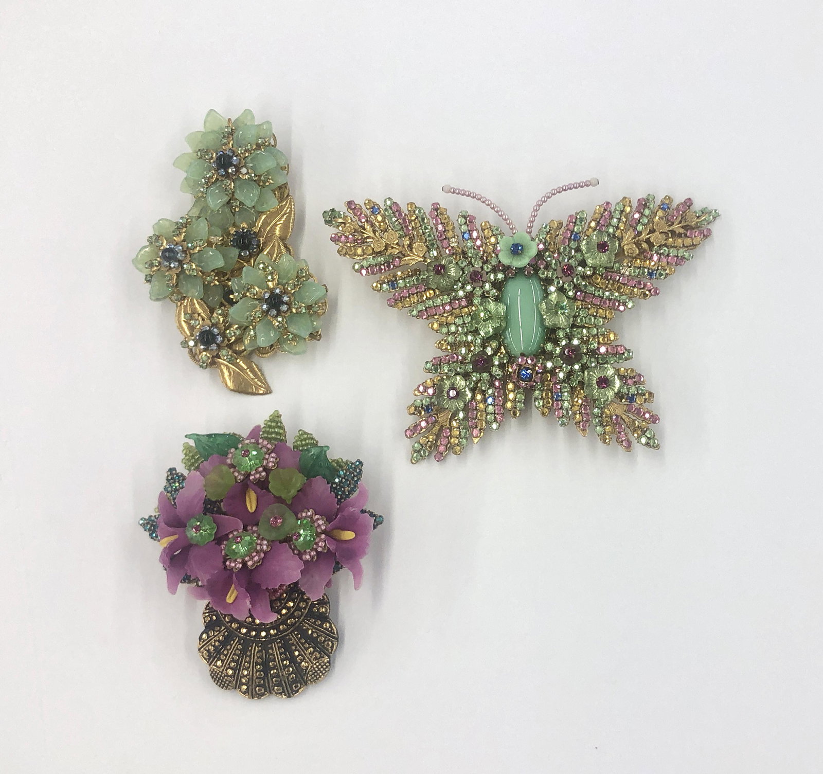 Three Stanley Hagler NYC costume brooches: Three Stanley Hagler NYC costume brooches Each signed STANLEY HAGLER NYC. dimensions of butterfly brooch 3 1/2 x 5 1/4in (9 x 13.5cm)Provenance: Property from the Estate of June D. Winkler, Beverly Hi