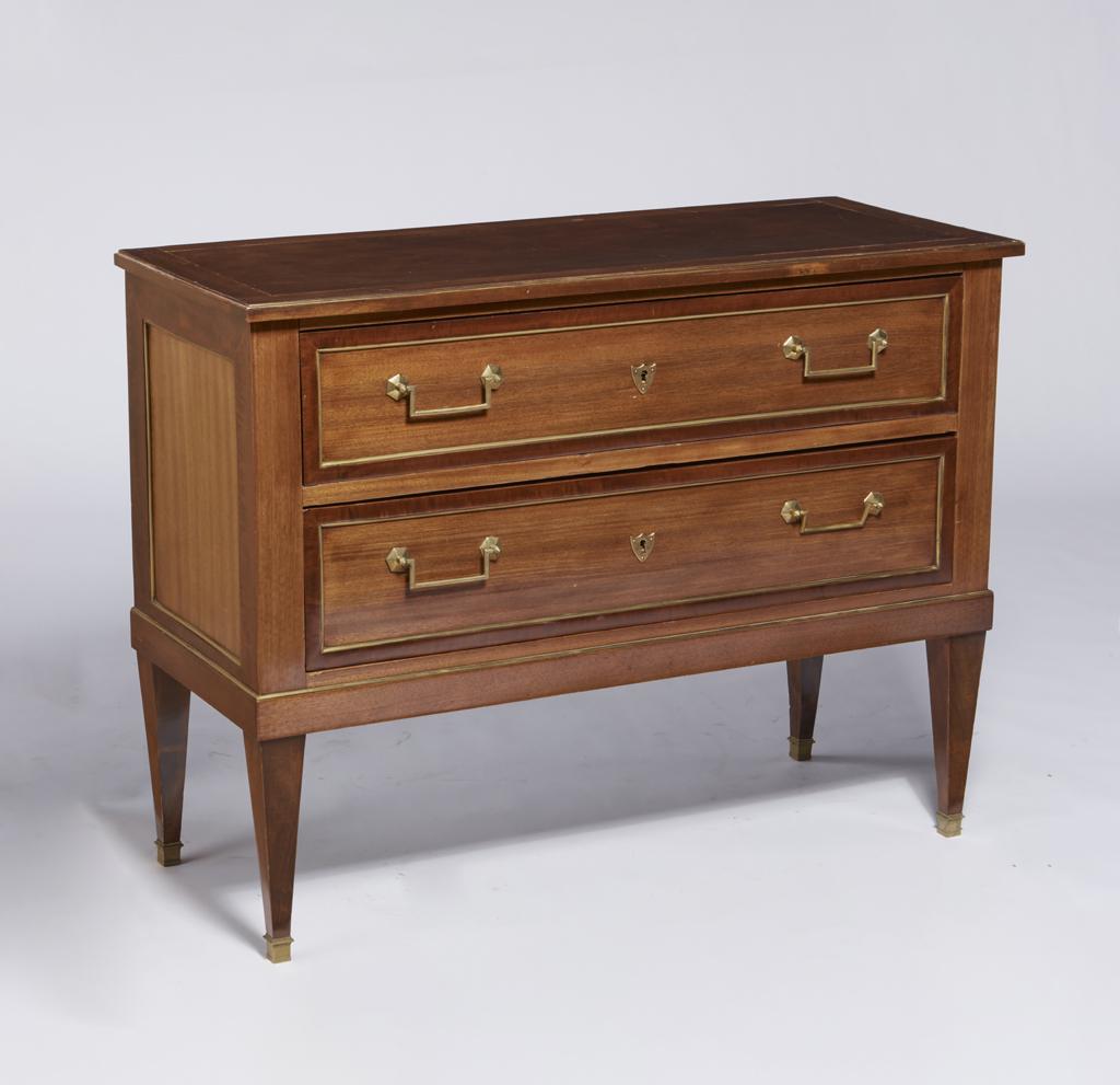 A Directoire style mahogany commode: A Continental Directoire style brass mounted mahogany commode 19th century height 33in (84cm); width 43 1/4in (110cm); depth 18 1/4in (46.5cm)Provenance: Property from a Private Collector, Pasadena, C