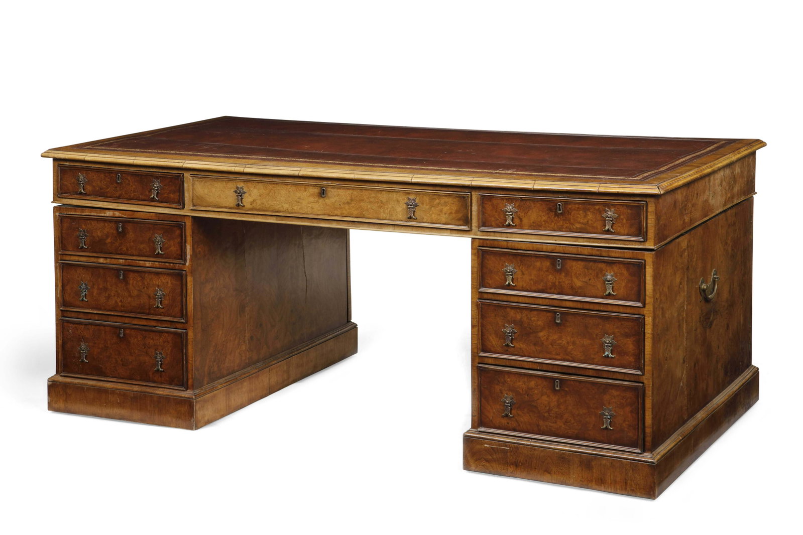 A George III style burl walnut pedestal partners desk: A George III style burl walnut pedestal partners desk Inset with a tooled leather writing surface. height 30 1/2in (77.5cm); width 72in (183cm); depth 36in (91.5cm)