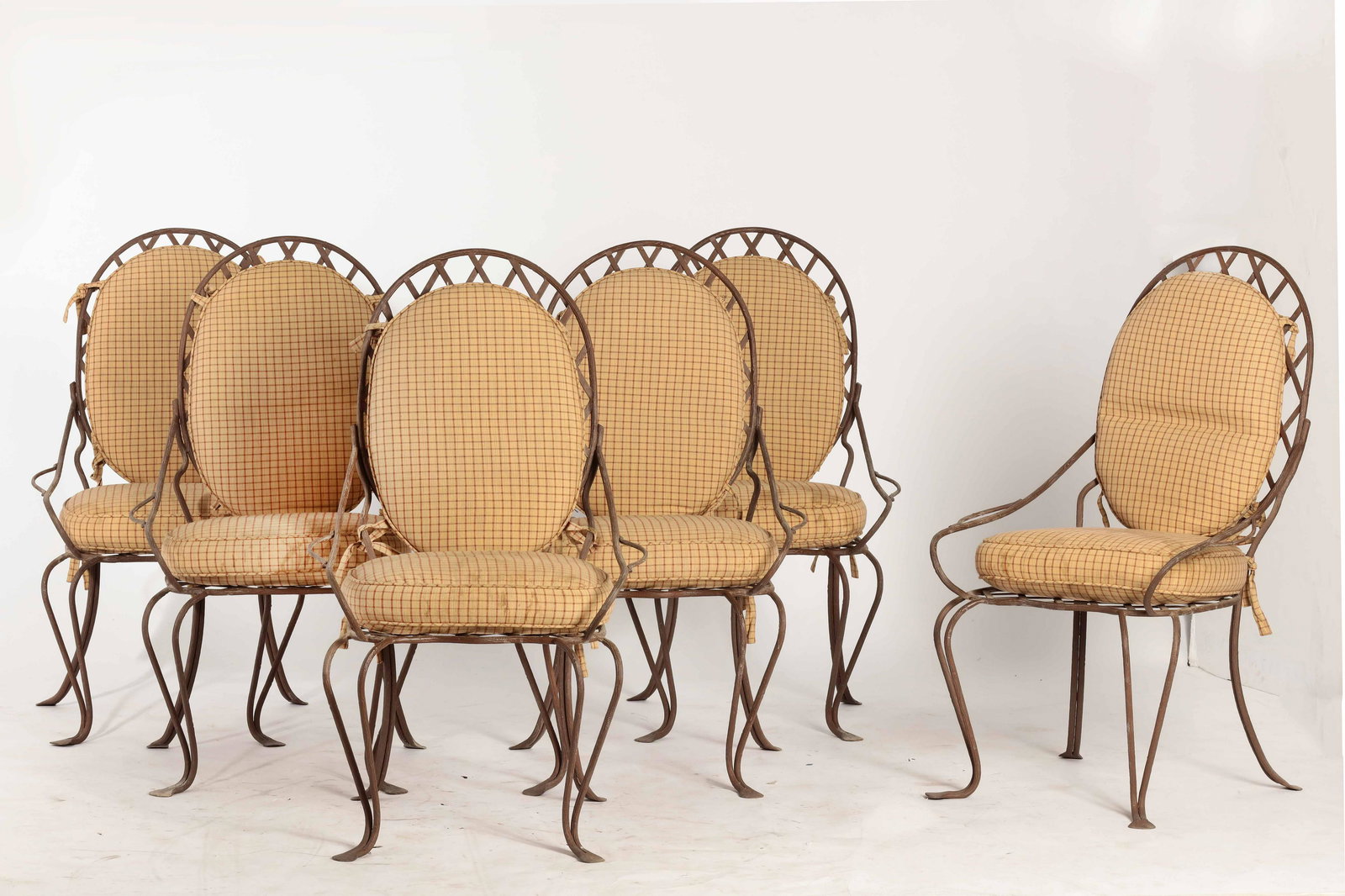 Six Rose Tarlow style iron Twig garden armchairs: A set of six Rose Tarlow style patinated iron Twig garden armchairs modern With associated cushion seats. height 41 1/2in (105.5cm); width 24 1/2in (62.25cm); depth of seat 15 1/2in (39.5cm)