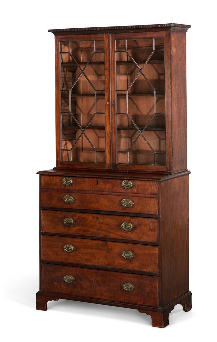 A George III mahogany secretary bookcase: A George III mahogany secretary bookcase fourth quarter 18th century The hinged fall enclosing a fitted interior of small drawers and pigeon holes. height 85 1/2in (217cm); width 44in (112cm); depth 2