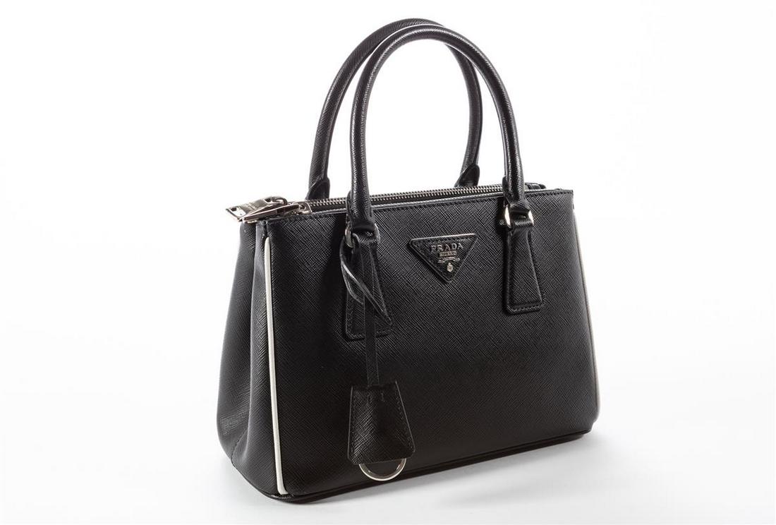A Prada black Saffiano leather mini Galleria tote: A Prada black Saffiano leather mini Galleria tote height 7in (18cm); width 9 1/2in (24cm); depth 4 1/2in (11.5cm)