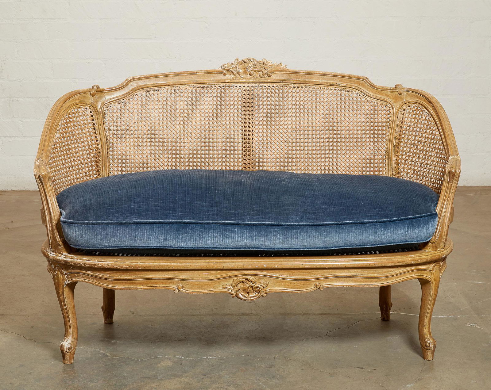 A Louis XV style cane paneled canape (1 of 4)