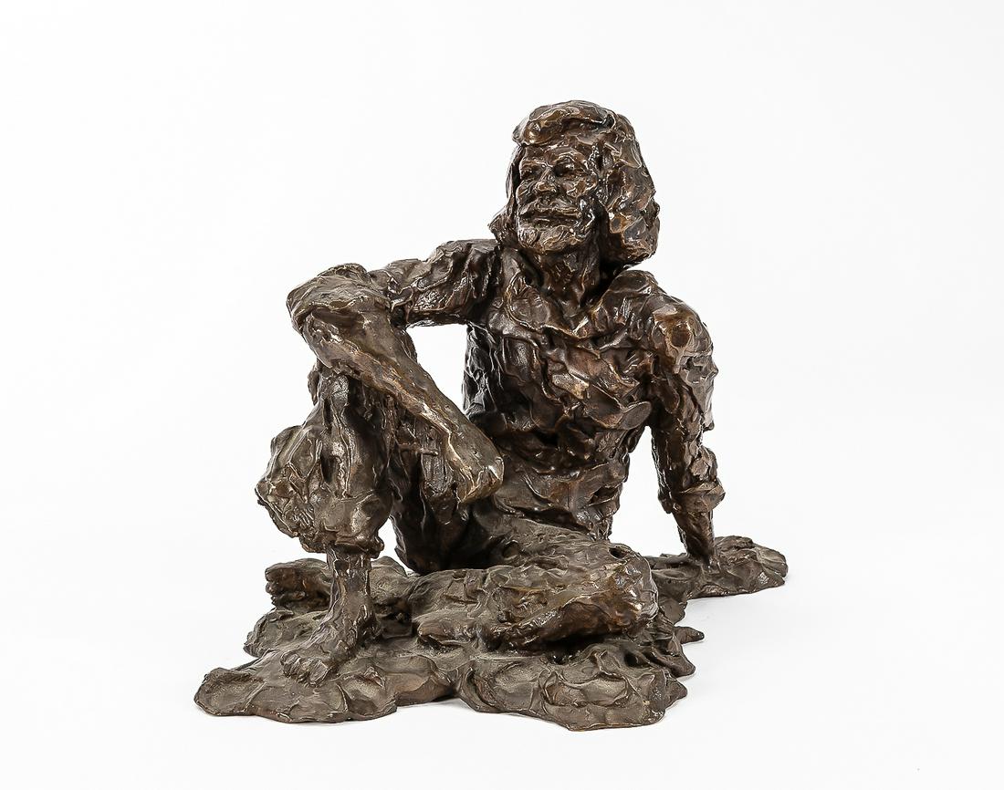 A  bronze model of a seated man 20th century (1 of 4)