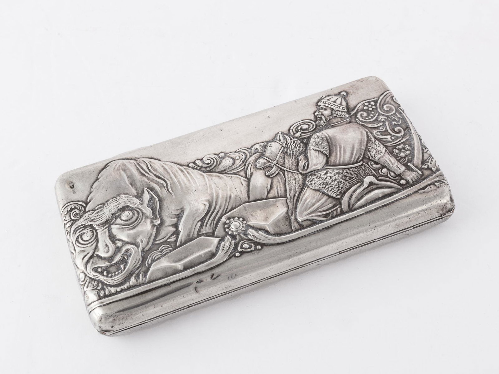 A Russian silver repousse decorated cigar case (1 of 5)