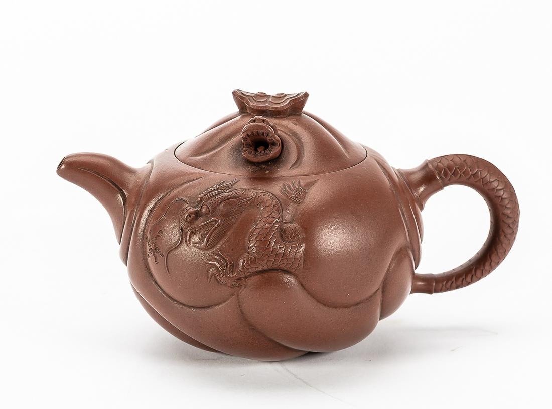 A Chinese Yixing ware figural pottery teapot (1 of 4)