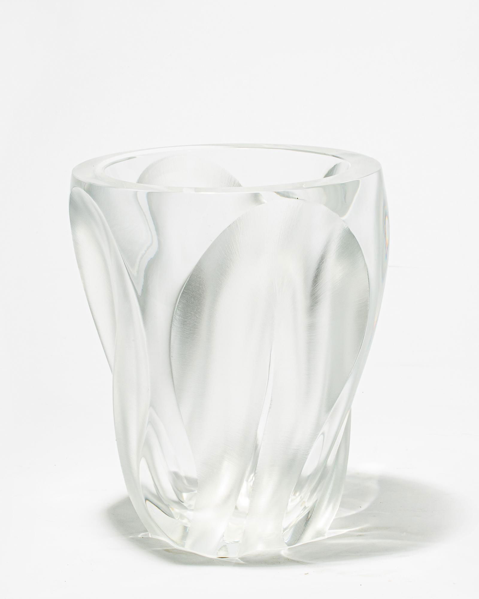 Lalique: a frosted and clear glass vase: Ingrid: Lalique: a frosted and clear glass vase: IngridEtched LaliqueÂ® France.height 10 1/4in (26cm); diameter 9in (23cm) Provenance: Property from a Newport Beach, California Collector.
