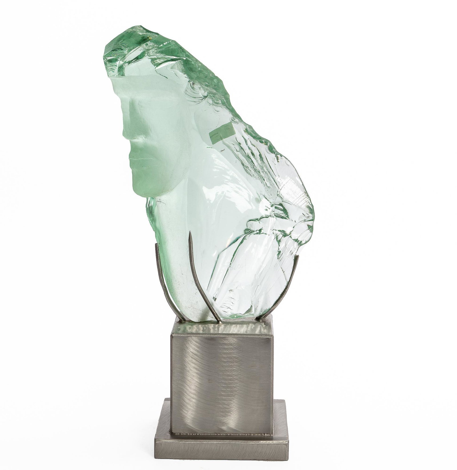 Suzanne Pascal, Bust, green glass: Suzanne Pascal (American, born 1914) Bust green glass Inscribed Pascal, raised on a brushed steel base. height overall 25 3/4in (65.5cm); width 11 1/4in (28.5cm); depth 8 1/2in (21.5cm)