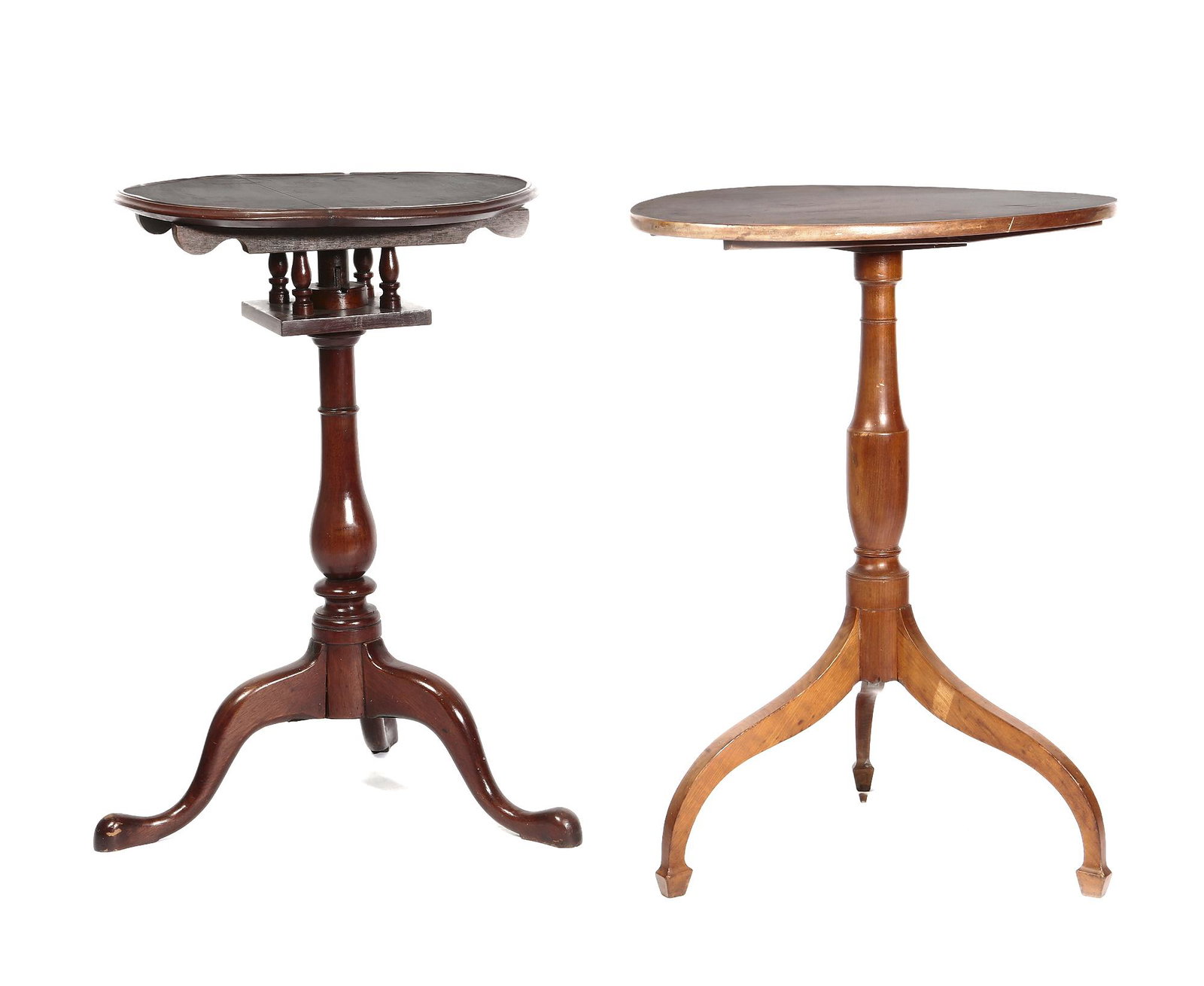 A Federal tilt-top cherry candle stand: A Federal tilt-top cherry candle stand early 19th century Together with a Chippendale mahogany dished top tilt-top birdcage candle stand, fourth quarter 18th century. height of the Federal candlestand