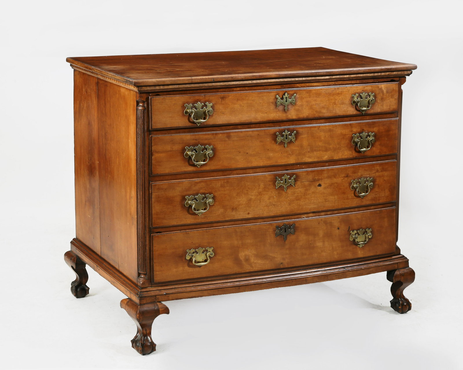 A Chippendale cherry chest of drawers: A Chippendale carved cherry chest of drawers fourth quarter 18th century and later Possibly the upper section of a high chest. height 39 1/4in (99.5cm); width 48 3/4in (124cm); depth 25in (63.5cm) Pro