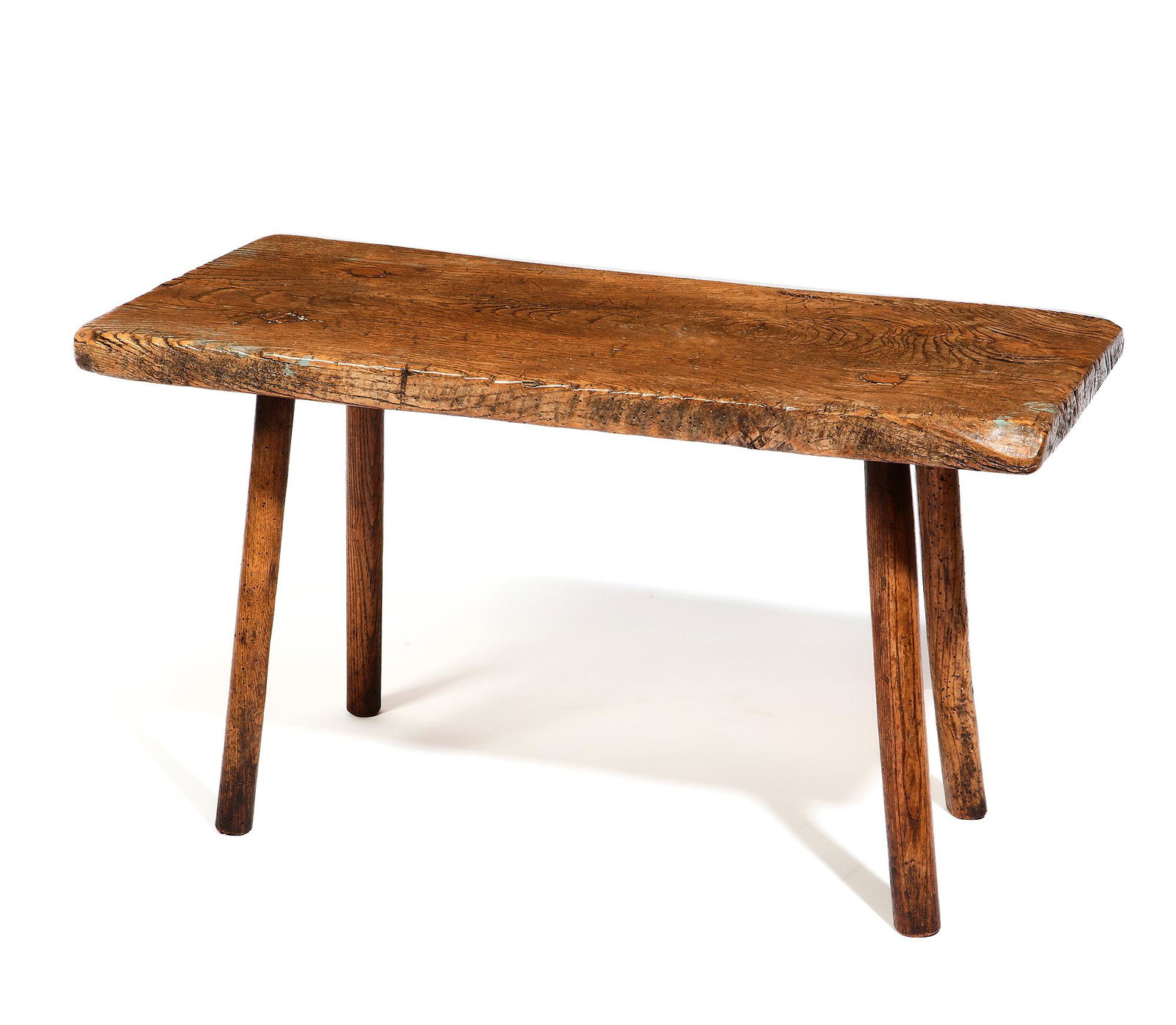 An elm low table probably English: An elm low tableprobably English19th centuryheight 15 1/4in (39cm); width 27in (68.5cm); depth 13 1/4in (33.5cm) Provenance: Property from a Private Washington D.C. and Connecticut Collector.