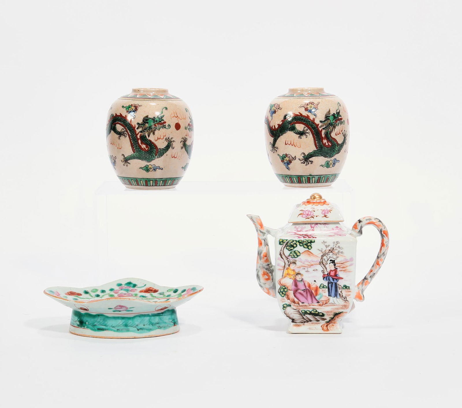 Four Chinese porcelain table articles: Four Chinese porcelain table articlesComprising a pair of vases, a teapot and a footed lobed dish.the teapot height 6 1/4in (16cm); length 6 1/2in (16.5cm)