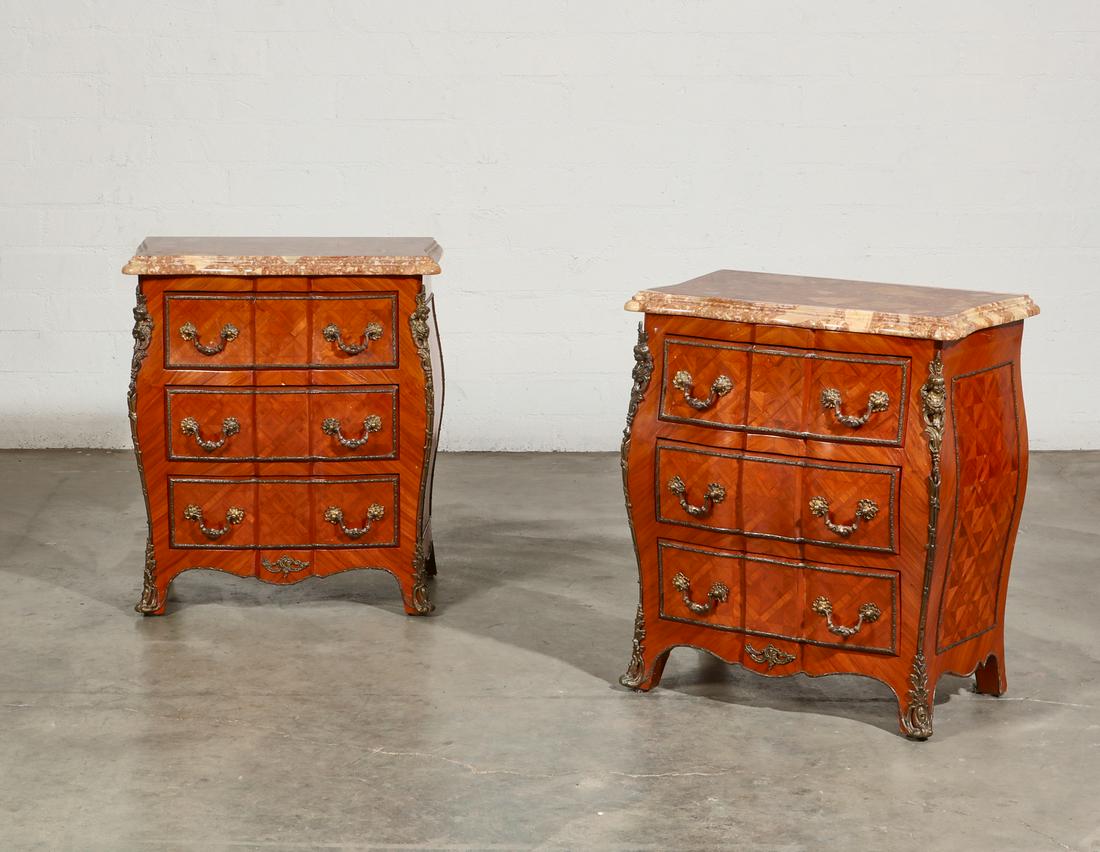 A pair of Louis XV style petit commodes: A pair of Louis XV style gilt bronze mounted tulipwood and parquetry petit commodespost 1950height 26in (66cm); width 22in (56cm); depth 13 1/2in (34cm)