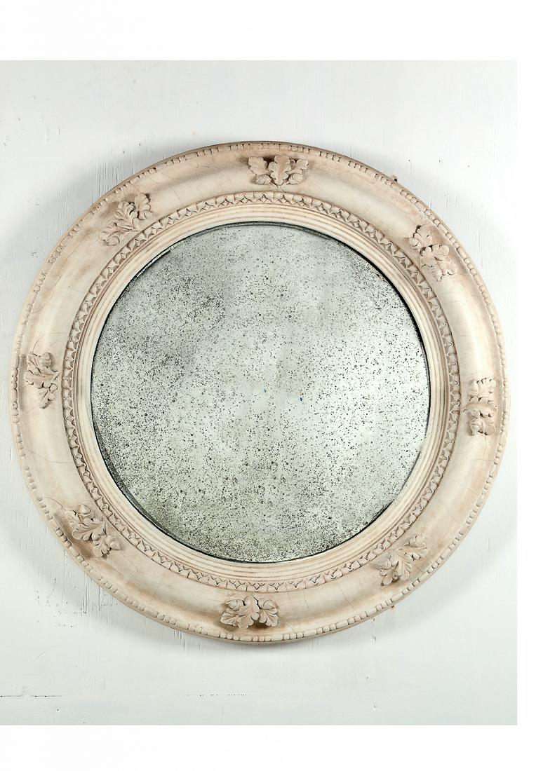 A pair of Regency style painted convex mirrors: A pair of Regency style cream painted convex mirrors post 1950 diameter 32 1/2in (82.5cm) Provenance: Property from a Private Collector, Santa Ynez, California.