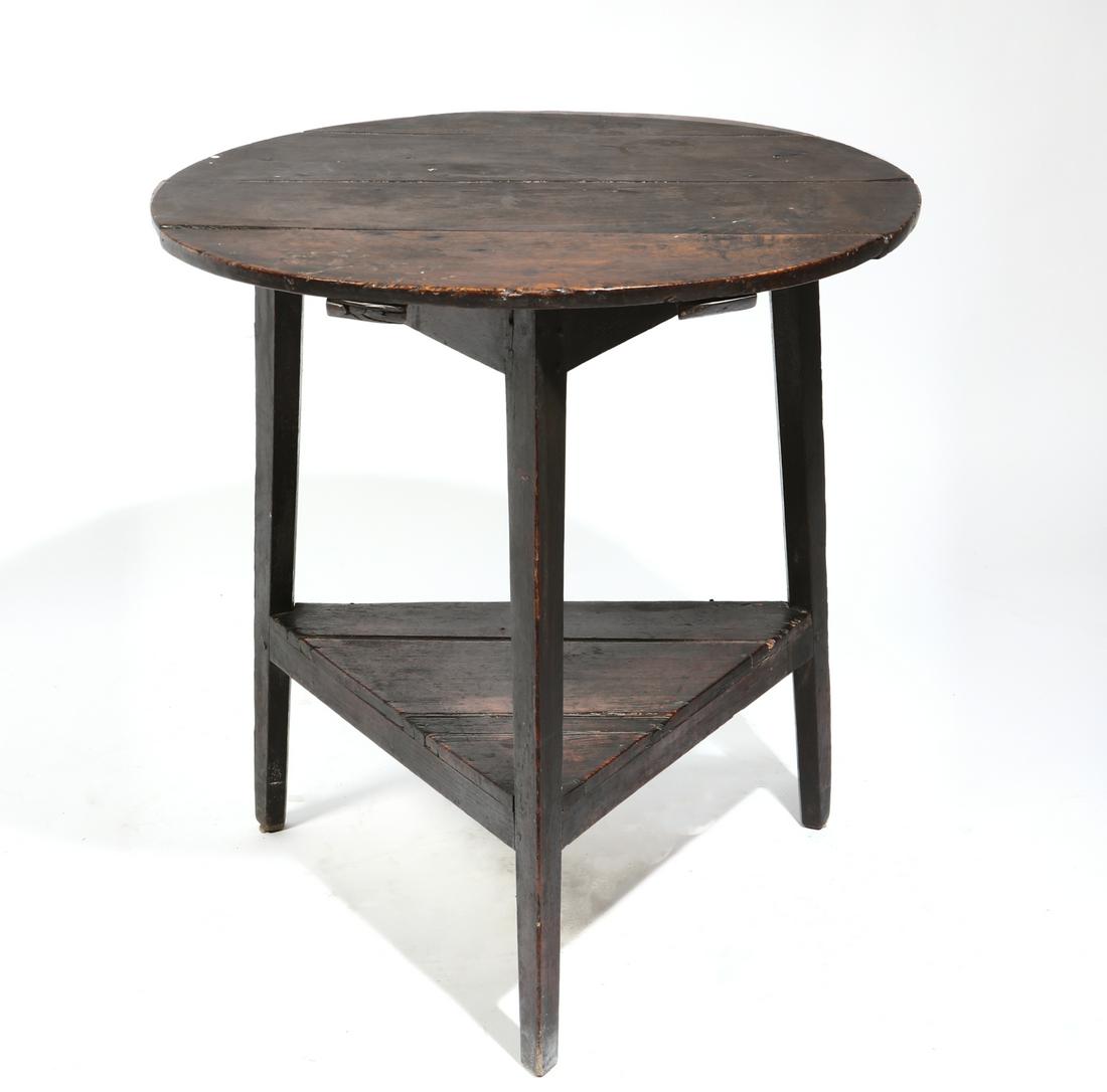An George III oak cricket table: An George III oak cricket table second half 18th century height 27 1/4in (69cm); diameter 26 1/2in (67cm) Provenance: Sold Wilkinsons Auctioneers, Doncaster, 27 February 2005, lot 376. Property of a P