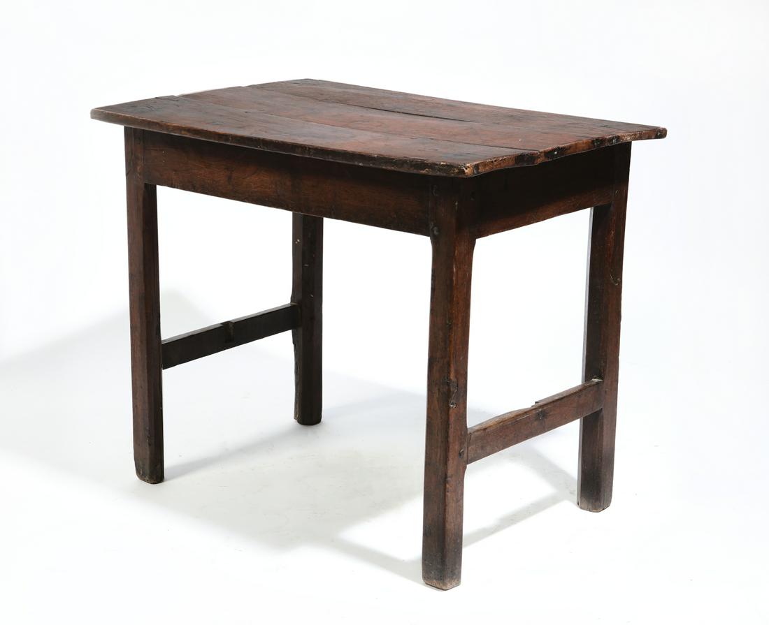A George III oak side table: A George III oak side table late 18th century height 36 3/4in (93.5cm); width 31 1/4in (79cm); depth 21 1/2in (54.5cm) Provenance: Property of a Private Southern California Collection.