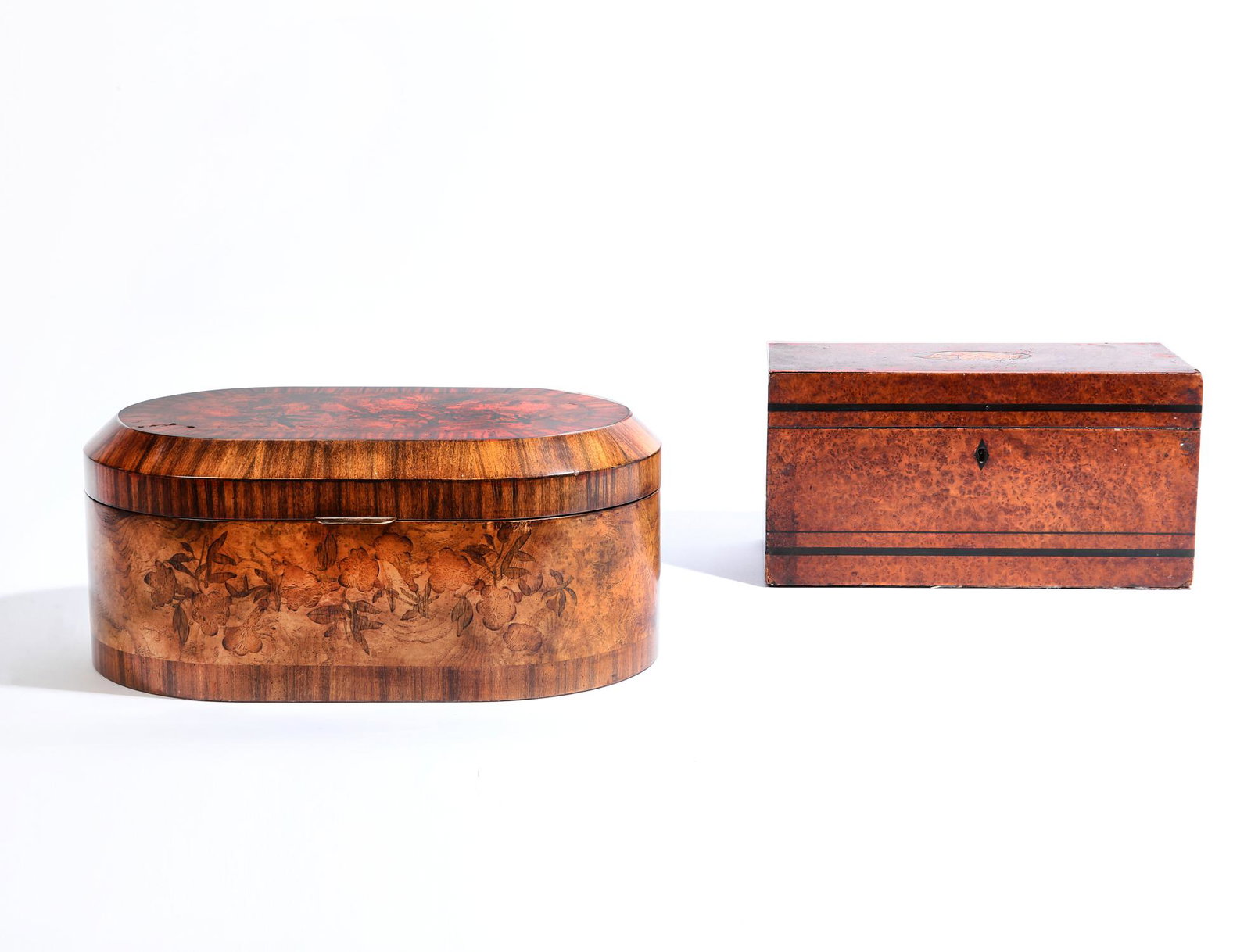 An English inlaid thuya wood tea caddy: An English inlaid thuya wood tea caddy late 19th century Lacking original divides and fittings; together with a Maitland Smith oblong inlaid table box. (2) the tea caddy height 7in (18cm); width 13 1/
