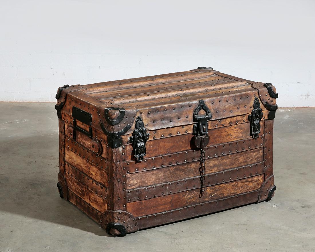 An American iron bound and leather trunk, Soule: An American iron bound and brass studded leather trunkWilliam S. Soule, Boston, Massachusettsfourth quarter 19th centuryHaving an applied brass plaque to the lid stamped MADE BY / WILLIAM S. SOULE / B