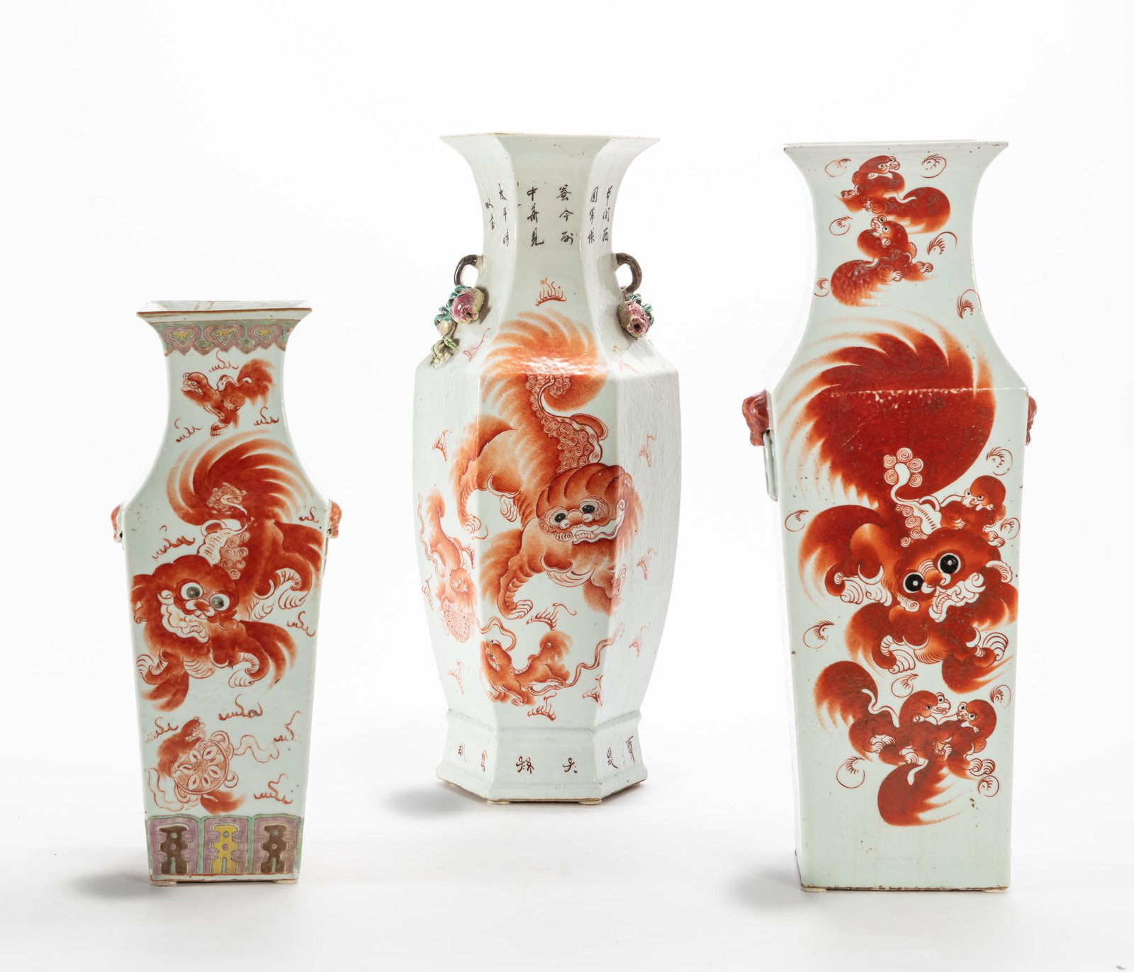 Three Chinese glazed vases: Three Chinese iron red, polychrome and white glazed vases One hexagonal, one rectangular and one square vase. (3) the largest height 23in (58.5cm) Provenance: Property from the Collection of Fabrizio 