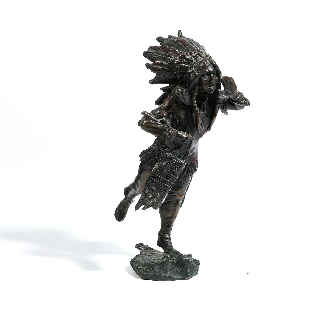 A bronze figure of a Native American, After Kauba: A patinated bronze figure of a Native American: Running Indian After Carl Kauba (Austrian, 1865-1922) post 1950 post 1950 Incised to the base C. Kauba, indistinctly stamped to one leg. height 9 1/2in 