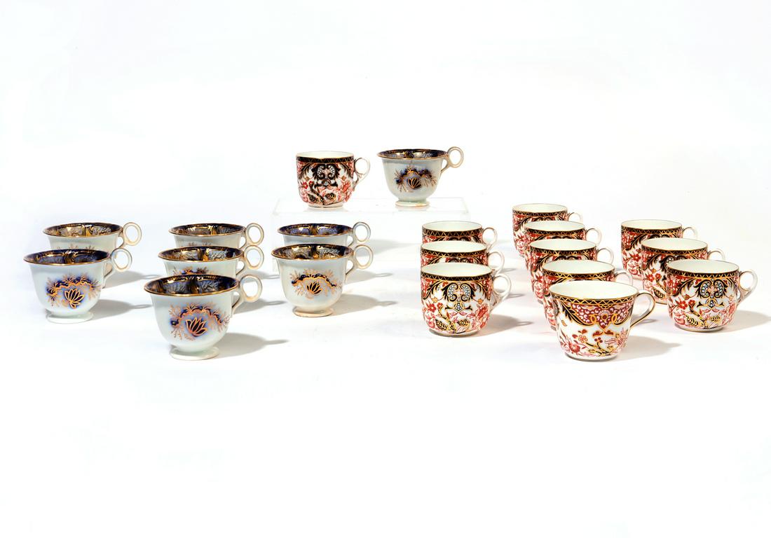 Twelve Royal Crown Derby porcelain Kings tea cups: A set of twelve Royal Crown Derby porcelain tea cups in the Kings patternPrinted factory mark above pattern number 383H together with eight English blue and white tea cups. (20)height of cup 2 1/2in (