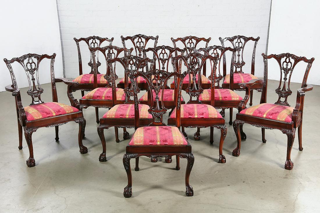 A set of twelve George III style dining chairs: A set of twelve George III style mahogany dining chairs post 1950 height 39 1/2in (100.5cm); width 26 1/2in (67cm); depth 17in (43cm) Provenance: Property from the Estate of June Ebensteiner, Westlake