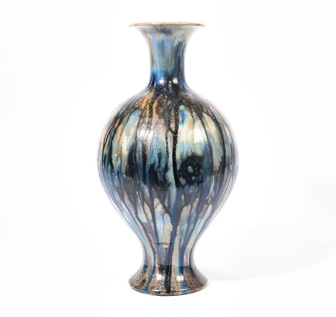 A French luster glazed earthenware vase, Guerin: A French luster glazed earthenware vase Guerin Stamped and incised Guerin to underside. height 20 1/2in (52cm) Provenance: Property from the Collection of Raymond Enkeboll.