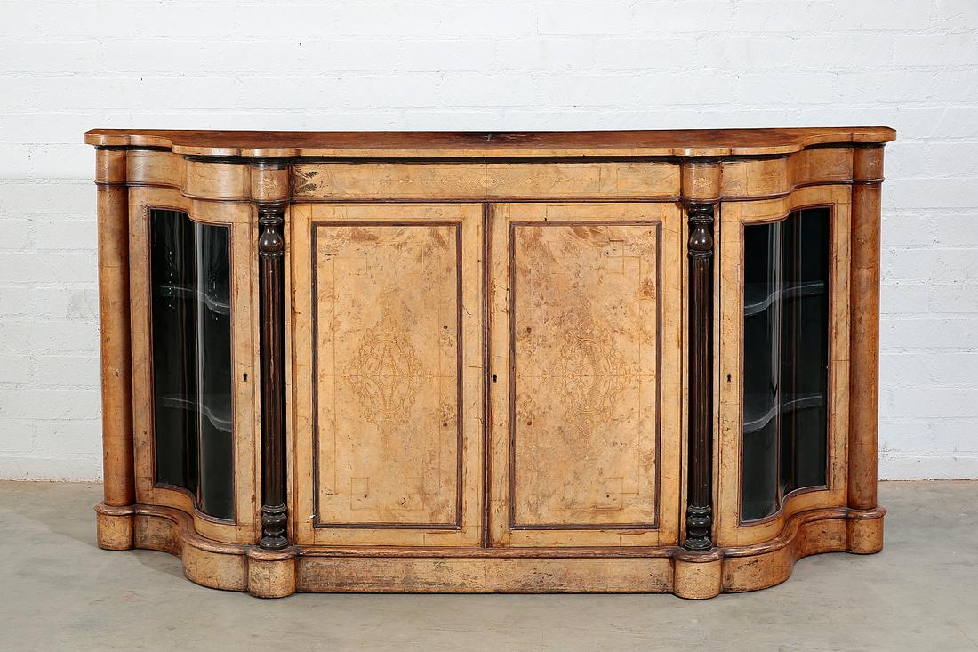A Continental walnut side cabinet: A Continental marquetry inlaid burl walnut side cabinet late 19th century height 41 1/2in (105.5cm); width 76 1/2in (194.5cm); depth 20in (51cm)