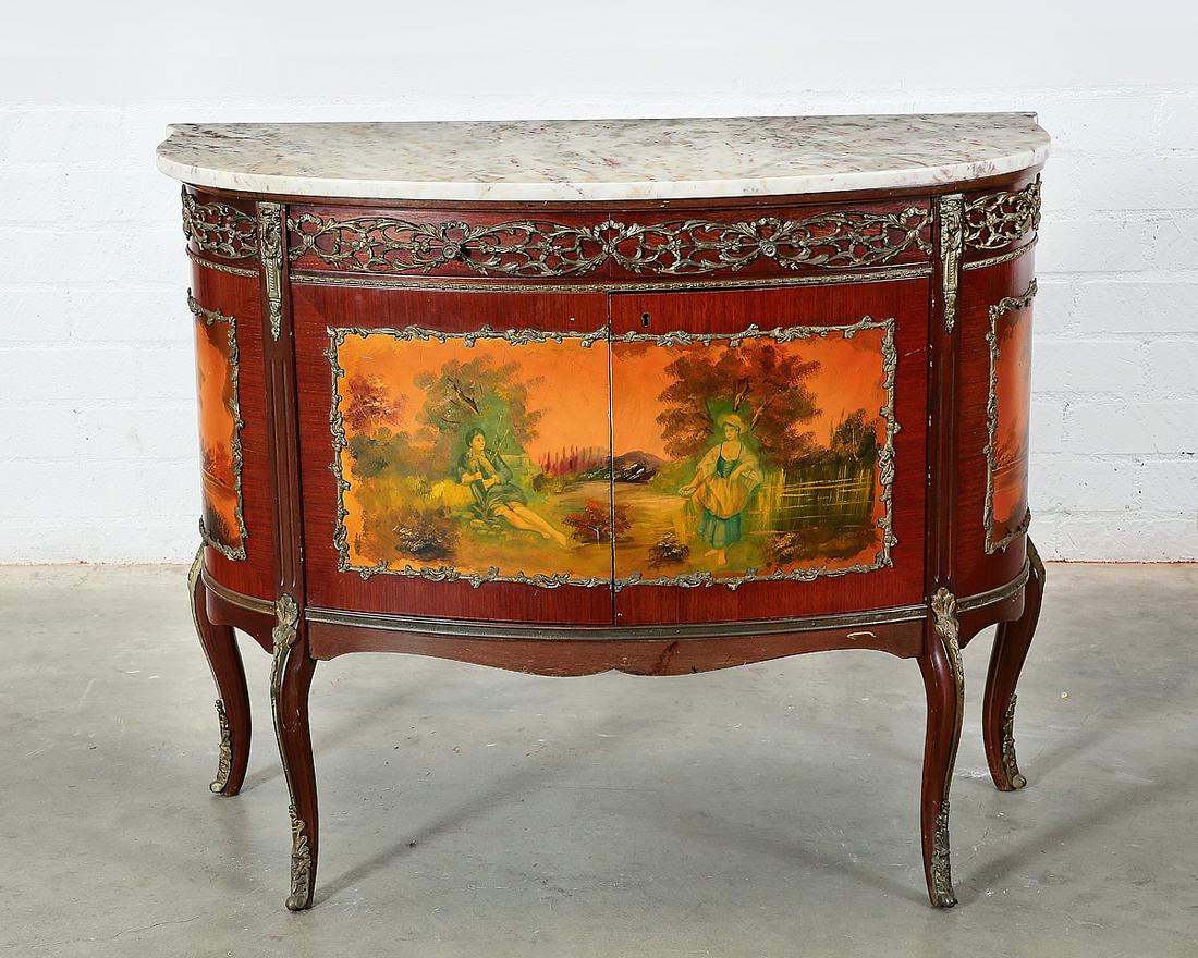 A Louis XV style gilt bronze mounted side cabinet: A Louis XV style gilt bronze mounted side cabinet 20th century Surmounted by a marble top with two frieze drawers below, the Vernis Martin style decorated cupboard opens to an open interior with mirro