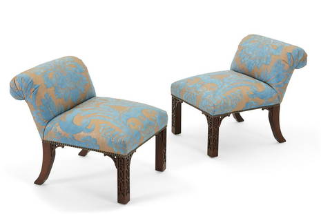 A pair of Billy Haines Fortuny elbow chairs: A pair of Chinese Chippendale style Fortuny cotton upholstered elbow chairsdesigned by William (Billy) Haines; retailed by Ted Graberpost 1950height 23in (58.5cm); width 19in (48cm); overall depth 25